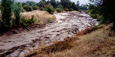 ALUVIONES EN CORDILLERA PROVOCA DESBORDES DE RÍO Y DAÑOS